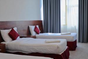 Postel nebo postele na pokoji v ubytování فندق الاصول