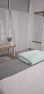 Ένα ή περισσότερα κρεβάτια σε δωμάτιο στο Depto eucaliptus