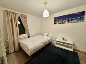 Ένα ή περισσότερα κρεβάτια σε δωμάτιο στο Villa med 3 sovrum +5 φωτογραφίες