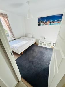 Ένα ή περισσότερα κρεβάτια σε δωμάτιο στο Villa med 3 sovrum