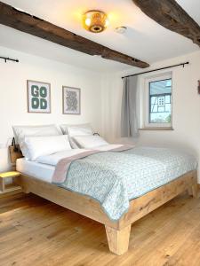 Postel nebo postele na pokoji v ubytování BergArt + 40 fotografií