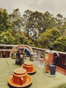 Příslušenství pro přípravu čaje a kávy v ubytování Pousada All Green - Monte Verde