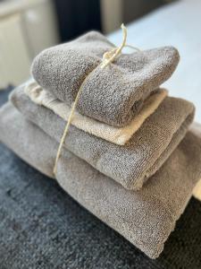 a pile of towels stacked on top of each other at Van de Gruiterwonen in Axel +50 photos