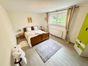 Ένα ή περισσότερα κρεβάτια σε δωμάτιο στο Le Mazal