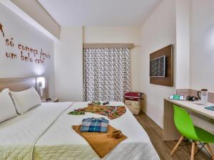 Postel nebo postele na pokoji v ubytování ibis Styles Vitoria da Conquista + 73 fotografií