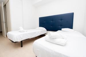 Postel nebo postele na pokoji v ubytování Boutique Apartments Panamá Coco del Mar