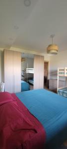 Postel nebo postele na pokoji v ubytování Jamari Sangro House