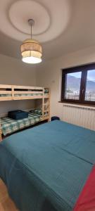 Postel nebo postele na pokoji v ubytování Jamari Sangro House + 17 fotografií