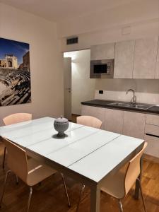 Η κουζίνα ή μικρή κουζίνα στο Lo Re City rooms