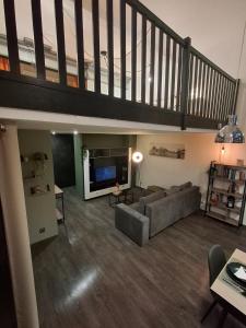 TV a/nebo společenská místnost v ubytování Appartement FLORILOFT + 36 fotografií