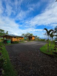 Κήπος έξω από το Revatua Lodge Puuru - Piscine privée et Petit-déjeuner inclus