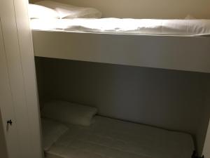 Ein Bett oder Betten in einem Zimmer der Unterkunft Merida