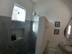 Koupelna v ubytování Chalé Begê + 15 fotografií