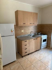 Η κουζίνα ή μικρή κουζίνα στο Departamento Fanti