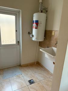 Ένα μπάνιο στο Departamento Fanti