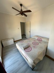 Ένα ή περισσότερα κρεβάτια σε δωμάτιο στο Departamento Fanti