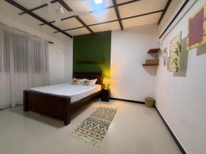 Postel nebo postele na pokoji v ubytování Garomzangi