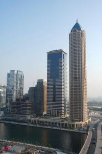 Nespecifikovaný výhled na destinaci Dubaj nebo výhled na město při pohledu z prázdninového domu + 11 fotografií