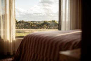 Postel nebo postele na pokoji v ubytování Box Hill Esperance