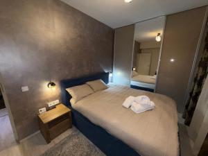 Ένα ή περισσότερα κρεβάτια σε δωμάτιο στο Apartment, 5 minutes from the Christmas market