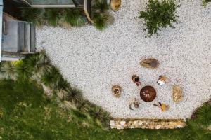 an overhead view of a garden with rocks and plants at Ferndale at Barranca - Luxury Villa in Barrengarry +29 photos