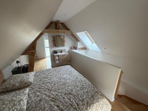 Postel nebo postele na pokoji v ubytování Catherine Maisonnette + 3 fotografie