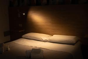 Postel nebo postele na pokoji v ubytování Appartamento completo parcheggio privato - Villa Ciaculli