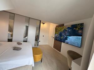 Giường trong phòng chung tại Apartment Anchor Luxury +127 ảnh