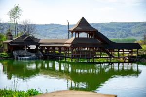 Fotografie z fotogalerie ubytování Pensiunea Ținutul Mărului 