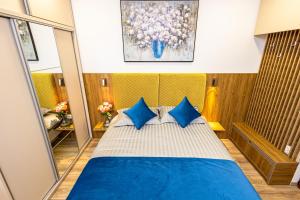 Postel nebo postele na pokoji v ubytování Pensiunea Ținutul Mărului + 23 fotografií