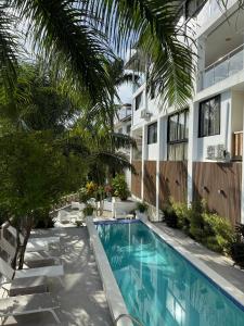 Bazén v ubytování Kainos Tropical Boutique Hotel nebo v jeho okolí