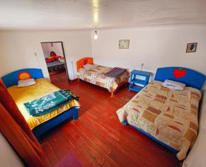 Postel nebo postele na pokoji v ubytování Hostel Rivendell Cusco + 29 fotografií