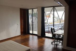 Ένα ή περισσότερα κρεβάτια σε δωμάτιο στο Residencia la Perla 3 habitaciones