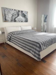 Postel nebo postele na pokoji v ubytování L'Albero della Vita