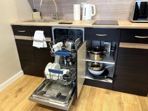 Kuchyň nebo kuchyňský kout v ubytování Cosy Guest Apartment Gdynia + 4 fotografie