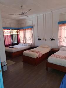 Ένα ή περισσότερα κρεβάτια σε δωμάτιο στο Tavua Hotel Ismail Investments