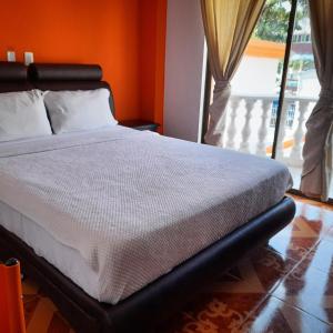 Postel nebo postele na pokoji v ubytování Hotel Leidy Resort