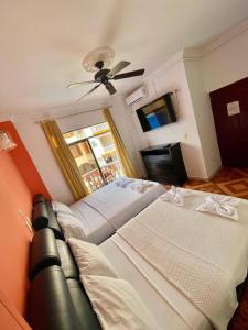 Postel nebo postele na pokoji v ubytování Hotel Leidy Resort