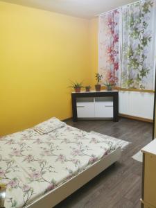 Postel nebo postele na pokoji v ubytování El'mehico House