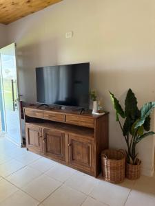 TV a/nebo společenská místnost v ubytování Casa Azul