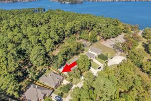 an aerial view of a house with a red arrow at Aspen Drive in Montgomery