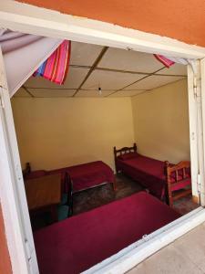 Ένα ή περισσότερα κρεβάτια σε δωμάτιο στο Pelito