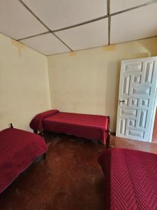 Ένα ή περισσότερα κρεβάτια σε δωμάτιο στο Pelito