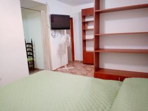 Postel nebo postele na pokoji v ubytování Marieta