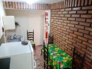 Kuchyň nebo kuchyňský kout v ubytování Marieta