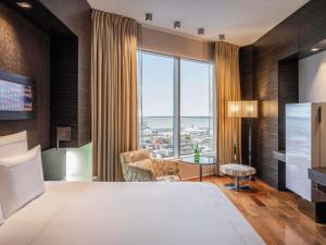Voodi või voodid majutusasutuse Swissotel Tallinn toas