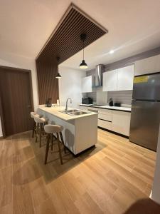 Η κουζίνα ή μικρή κουζίνα στο Los Magicos Apartments, Punta Cana