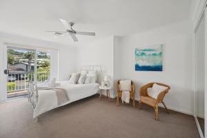 Postel nebo postele na pokoji v ubytování Beachfront Retreat - Ducted Air - Free Wifi