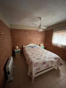 Postel nebo postele na pokoji v ubytování Cabañas Don Lelio