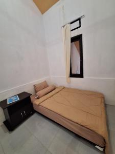 Postel nebo postele na pokoji v ubytování La Calma House